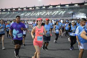 BIB: 5084, 50075, 50409
                            <button type="button" onclick="openModal(10463566)" class="btn btn-primary btn-sm float-right btn-popup" data-toggle="modal" data-target=".modal-high-quality">
                        <i class="fas fa-shopping-cart"></i> Add to Cart
                    </button>
                                            <button type="button" onclick="isThisMe(10463566, true)" class="btn btn-success btn-sm float-right btn-popup btn-isme hidden" data-toggle="tooltip" data-placement="bottom" title="นี่คือรูปของคุณใช่ไหม คลิกที่นี่เพื่อเอาเข้าอัลบั้ม">
                        <i class="fas fa-plus"></i> Add to album
                    </button>
                    <button type="button" onclick="isThisMe(10463566, false)" class="btn btn-warning btn-sm float-right btn-popup btn-isnotme hidden">
                        <i class="fas fa-ban"></i> Remove from album
                    </button>